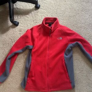 Red North Face zip up